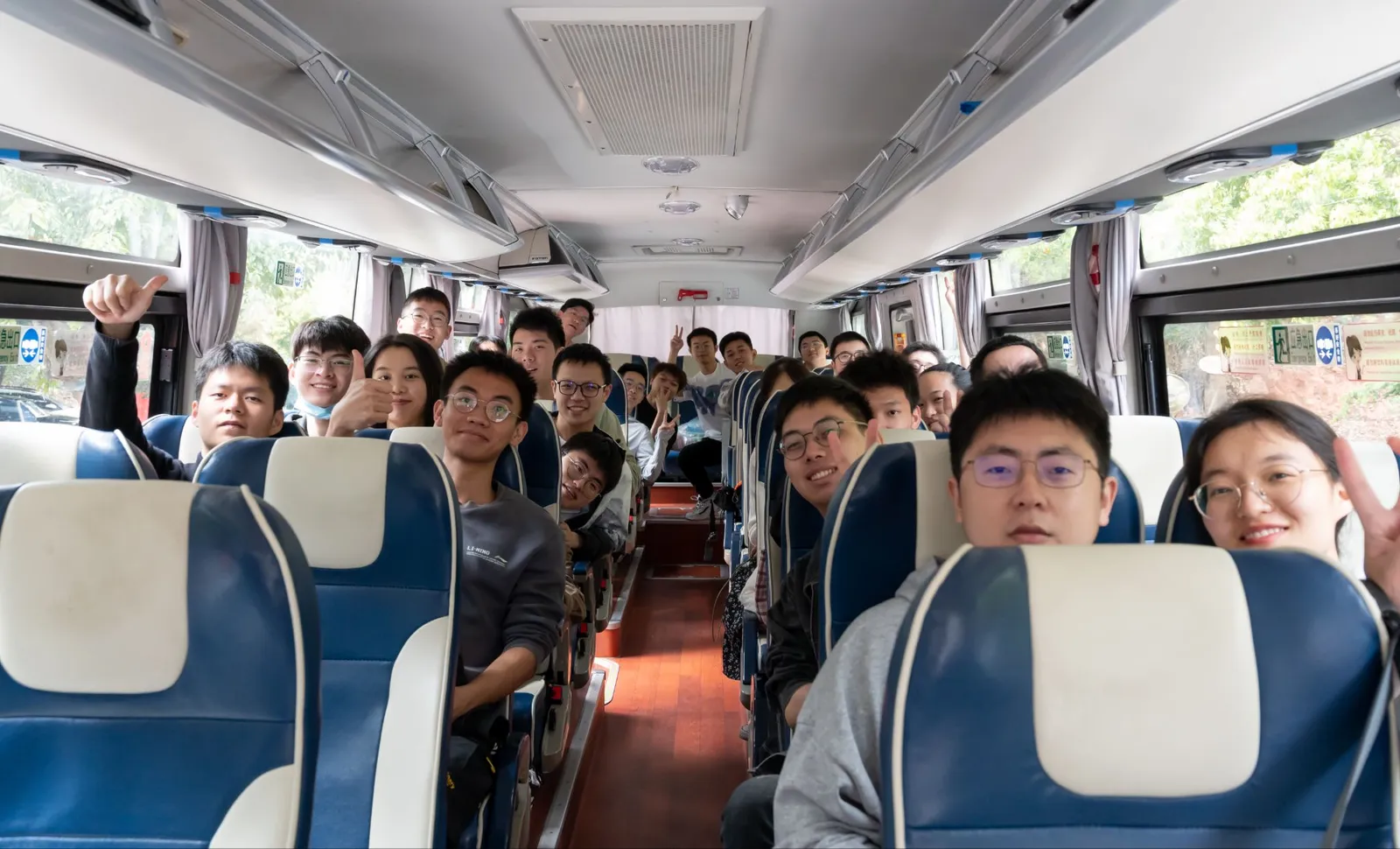 On the bus to the spring outing at Longquan Villa